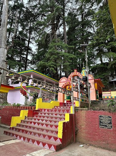 Traditional Aipan design stairs in Haat Kalika Temple